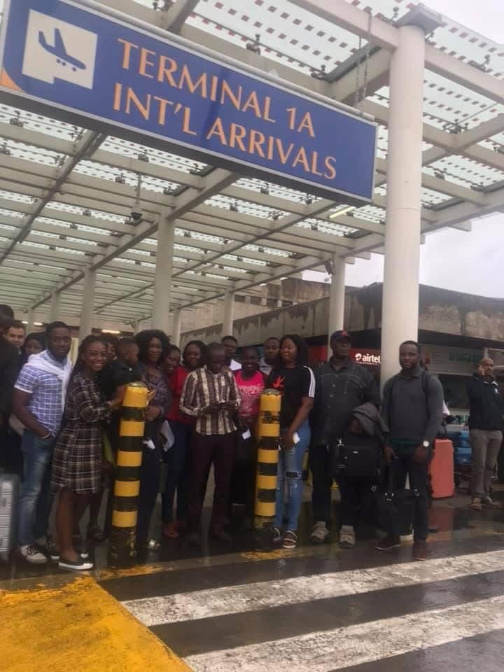 Clients arriving at an international airport terminal